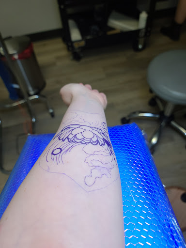 Explore mom son tattoo ideas, creative tattoo ideas in Loganville, available at Blue Siren Tattoos