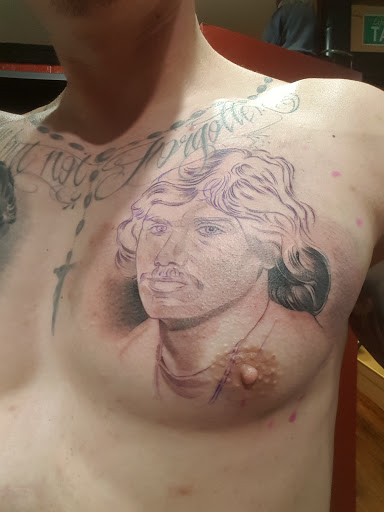 Explore tiny ankle tattoo ideas, creative tattoo ideas in Carson, available at Lifestyle Tattoos