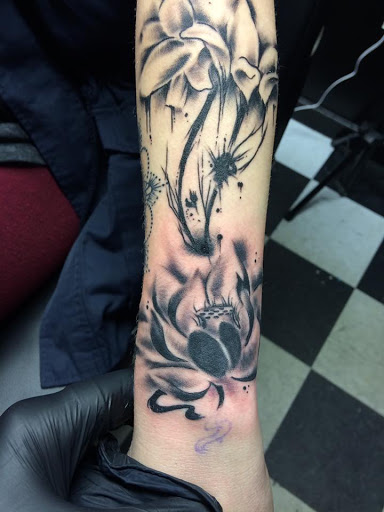 Explore axe tattoo ideas, creative tattoo ideas in Nampa, available at Temptation Tattoo & Body Piercing