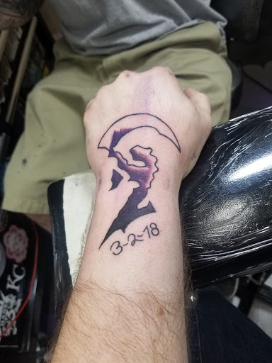 Explore bone tattoo ideas, creative tattoo ideas in Liberty, available at Dark Lotus Tattoo & Salon