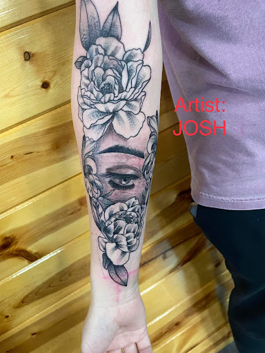 Explore anunnaki tattoo ideas, creative tattoo ideas in Foley, available at Symbolic Ink Tattoo Studio