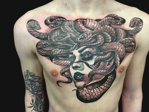 Explore tattoo ideas for belly button, creative tattoo ideas in Waukesha, available at Custom Tattoo