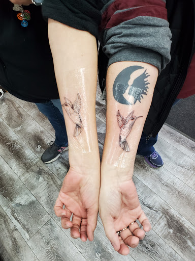 Explore tattoo ideas for father daughter, creative tattoo ideas in Bemidji, available at Living Legends Tattoo and Piercing LLC
