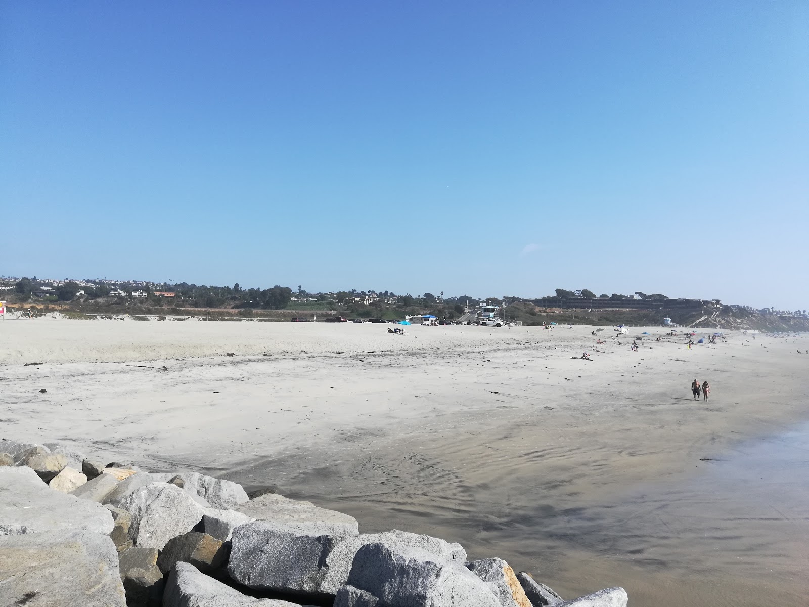 Fotografie cu South Ponto beach cu o suprafață de nisip ușor și pietricel
