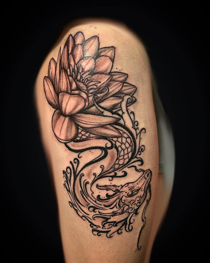 Explore arm blackout tattoo ideas, creative tattoo ideas in Erie, available at Code of Honor Tattoo