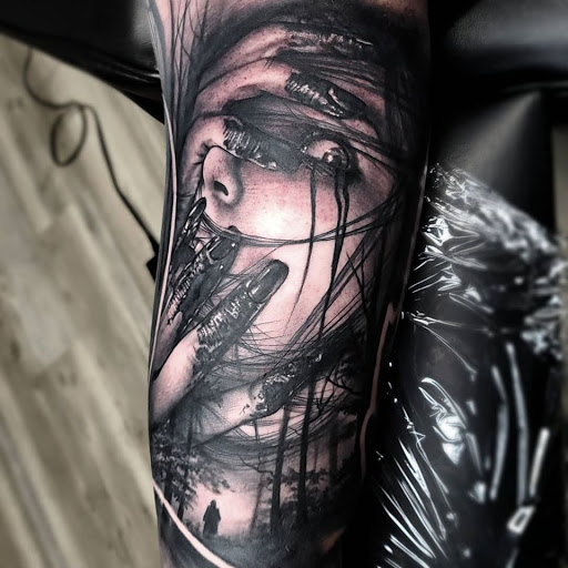 Explore invincible tattoo ideas, creative tattoo ideas in Utica, available at Watchtower Tattoo Company