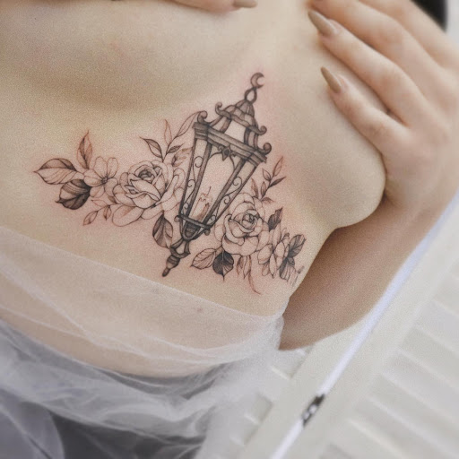 Explore flower arm sleeve tattoo ideas, creative tattoo ideas in Orange, available at Baron Art Tattoo