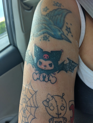 Explore little ghost tattoo ideas, creative tattoo ideas in Duluth, available at Tattoo Fiesta