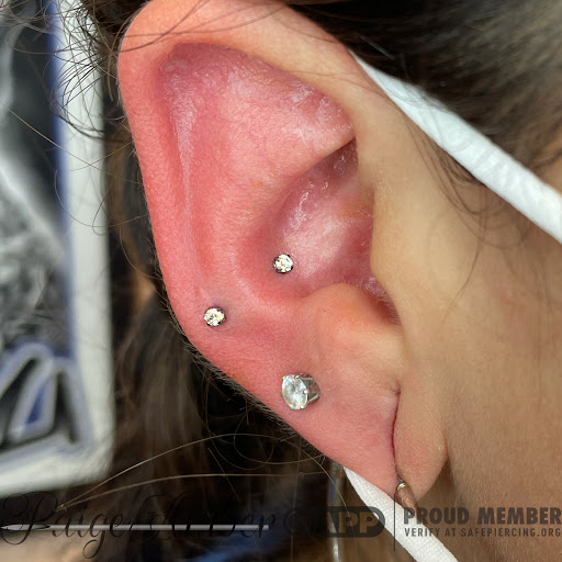Explore e.t. tattoo ideas, creative tattoo ideas in Oshkosh, available at Piercings by Paige at Big Guns Tattoo