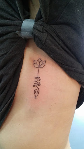 Find tattoo ideas for stepson for your next unique tattoo in Fort Myers at Tiger Lotus Tattoo and Piercing