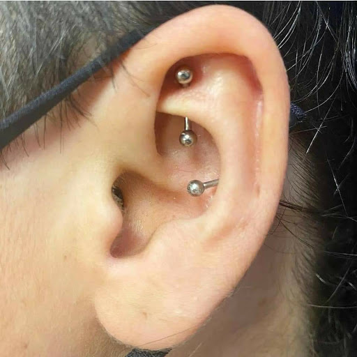 Explore cover up tattoo ideas on forearm, creative tattoo ideas in Charleston, available at Exotic Impressions Body Piercing