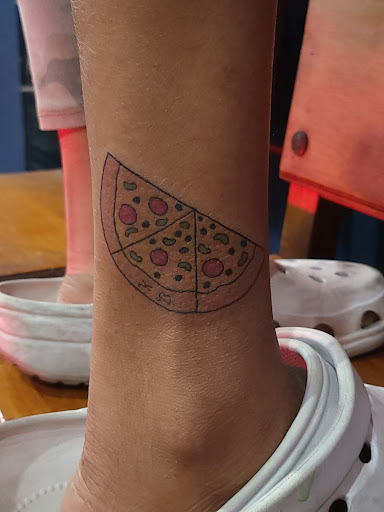 Find cow tattoo ideas for your next unique tattoo in Antioch at Flying Dutchman Tattoo