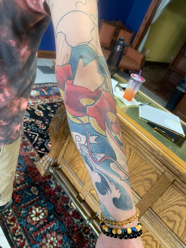 Explore cheek tattoo ideas, creative tattoo ideas in Lake Crystal, available at Arcadium Tattoo