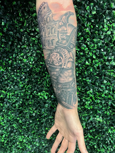 Explore snoopy tattoo ideas, creative tattoo ideas in Gulfport, available at Phantom Art Studio