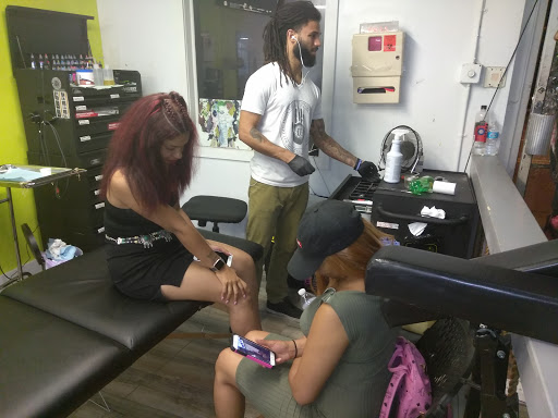 Explore hunting sleeve tattoo ideas, creative tattoo ideas in Atlanta, available at Iron Palm Tattoos & Body Piercing Atlanta