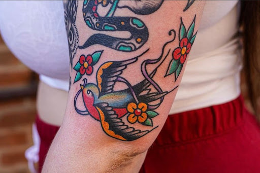 Explore men's fine line tattoo ideas, creative tattoo ideas in Springfield, available at Good Heart Tattoos