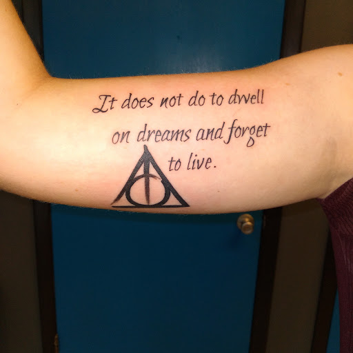 Explore ribbon tattoo ideas, creative tattoo ideas in Saint Petersburg, available at Ink Godz Tattoos