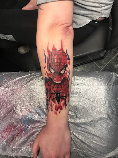 Explore forearm tattoo name ideas, creative tattoo ideas in Macomb, available at Nevermore Tattoo Gallery