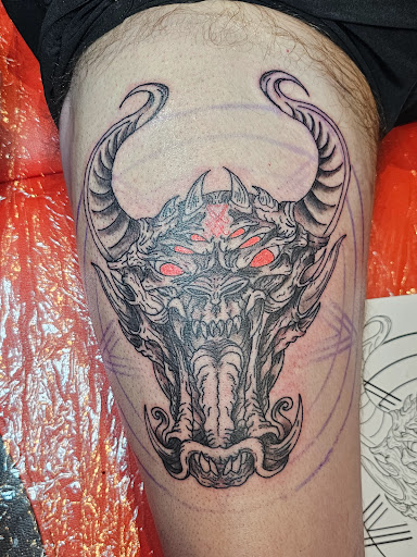 Explore bite me tattoo ideas, creative tattoo ideas in Cambridge, available at Kappa Tattoo