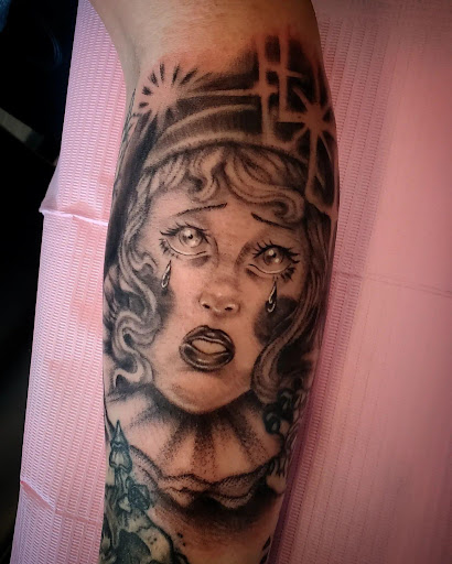 Explore footprint tattoo ideas, creative tattoo ideas in Palm Harbor, available at Angry Owl Tattoo and Piercing