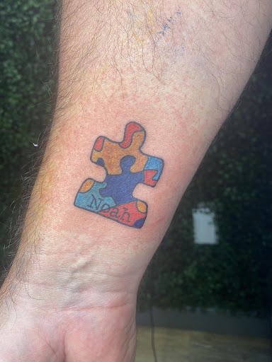 Explore construction worker tattoo ideas, creative tattoo ideas in Oviedo, available at Fine Ink Studios Tattoos