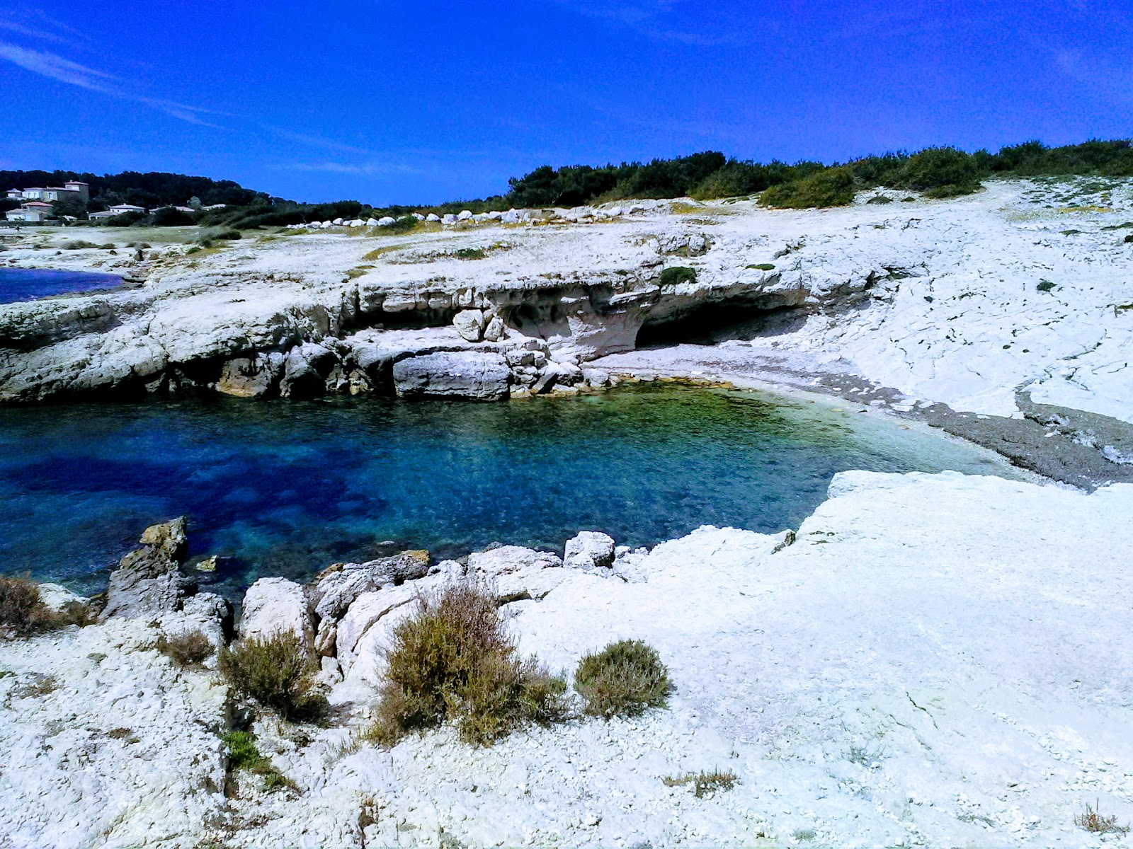 Foto van Plage Crique met turquoise puur water oppervlakte