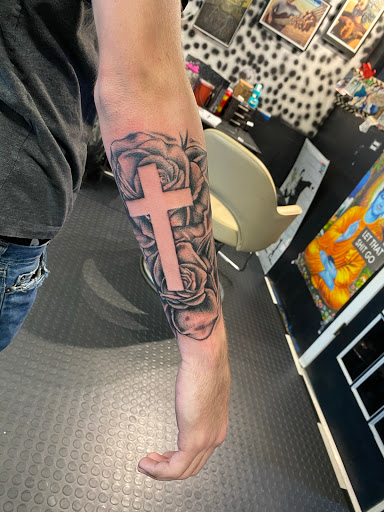 Find unique family tattoo ideas for your next unique tattoo in Chillicothe at Grimey Inc Tattoos