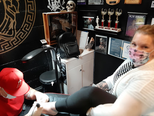 Explore puppy tattoo ideas, creative tattoo ideas in Denver, available at Nocturnal Tattoo