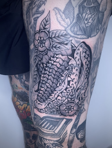 Explore peace tattoo ideas, creative tattoo ideas in New Orleans, available at TOUGH LOVE TATTOOS