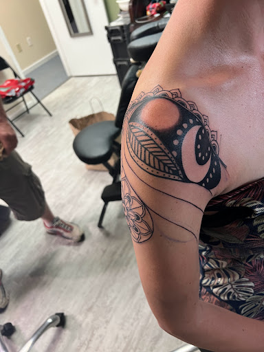 Explore flower tattoo ideas for guys, creative tattoo ideas in Alfred, available at Tattooed Spirit