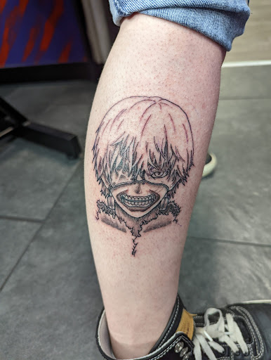 Explore beach themed tattoo ideas, creative tattoo ideas in Cadillac, available at Warchief Tattoo, LLC