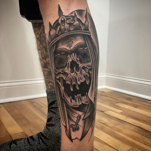 Find boyfriend name tattoo under breast ideas for your next unique tattoo in Kansas City at Golden Stag Tattoo and Gallery