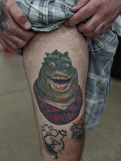 Find time clock tattoo ideas for your next unique tattoo in Fort Gratiot at Sarenity Tattoo & Body Piercing