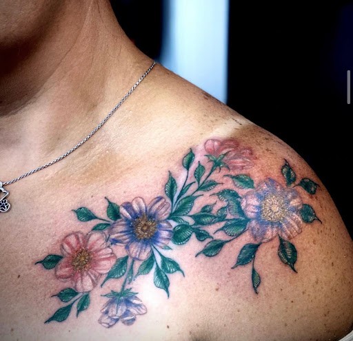 Explore cross cover up tattoo ideas, creative tattoo ideas in Tiffin, available at Ink Element Tattoo Studio