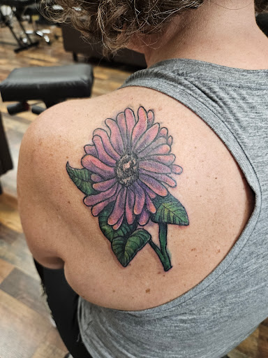 Explore to infinity and beyond tattoo ideas, creative tattoo ideas in Grovetown, available at Art Collective Tattoos & Piercings