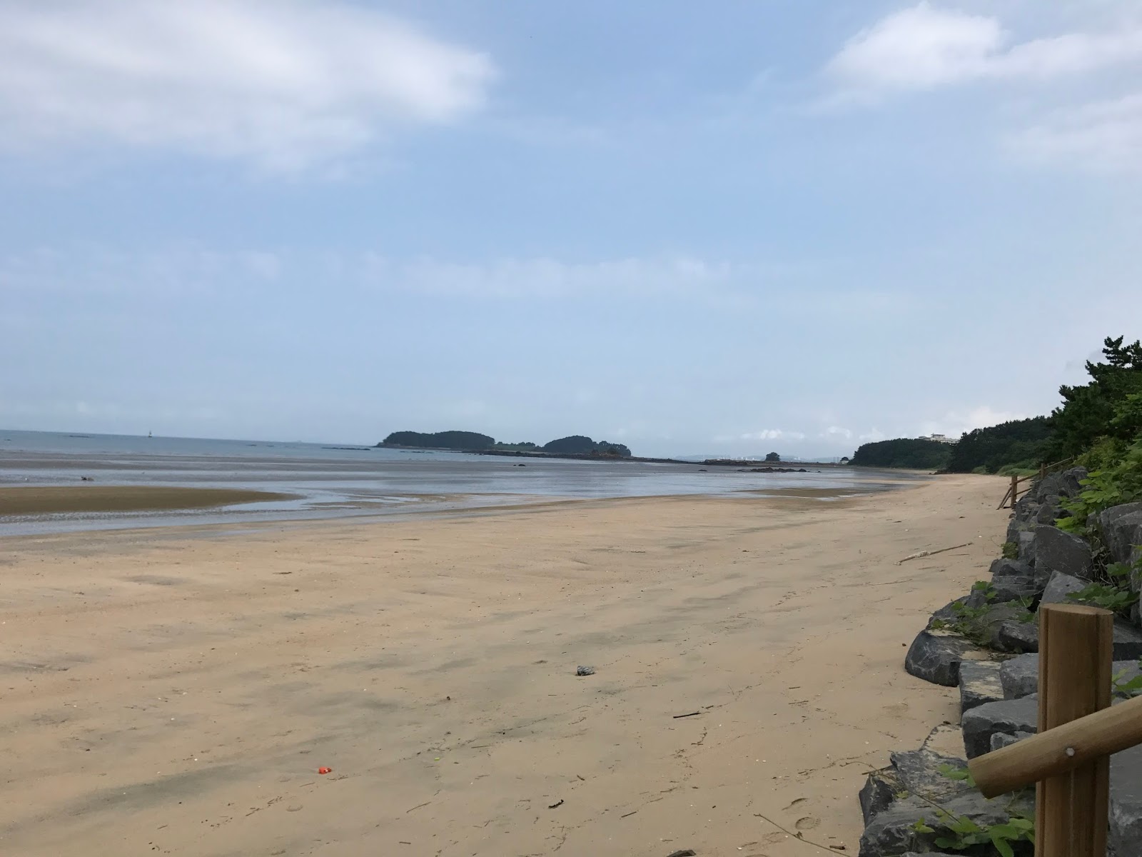 Photo de Doksan Beach avec droit et long
