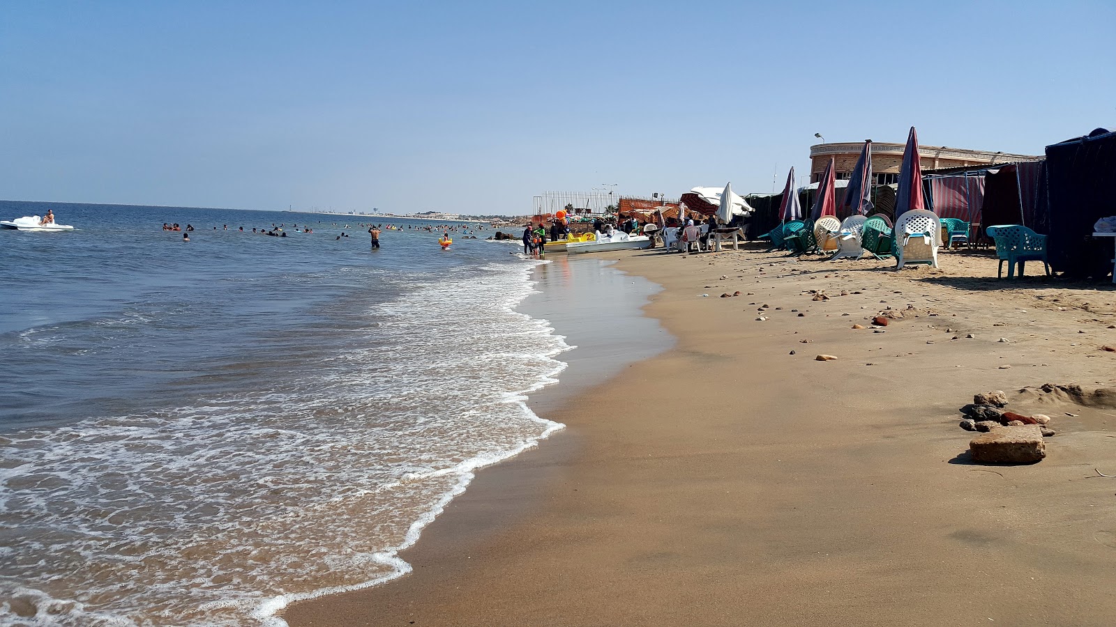 Φωτογραφία του Port Fouad Beach με φωτεινή άμμος επιφάνεια