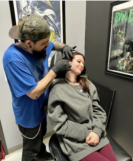 Find music notes tattoo ideas for your next unique tattoo in Rochester at American Pride Tattoos Rochester