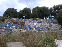 Kanoni Beach'in fotoğrafı dağlarla çevrili
