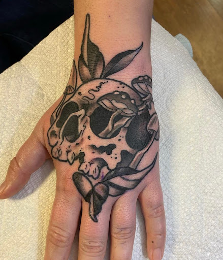 Explore banksy tattoo ideas, creative tattoo ideas in Muncie, available at Fox & Sparrow Tattoo