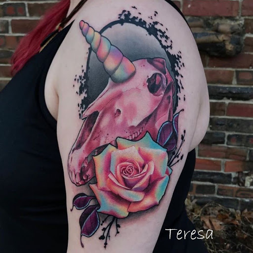 Explore boxing gloves tattoo ideas, creative tattoo ideas in Sanford, available at Venom Ink Tattoo