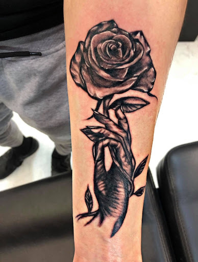 Explore mens behind the ear tattoo ideas, creative tattoo ideas in San Antonio, available at Nite Owl Tattoo Studio