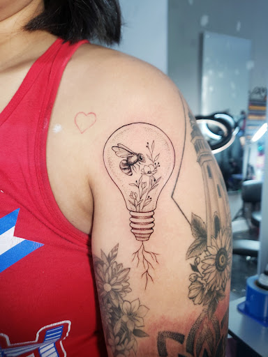 Explore radiohead tattoo ideas, creative tattoo ideas in Miami, available at Glitterpoop Studios