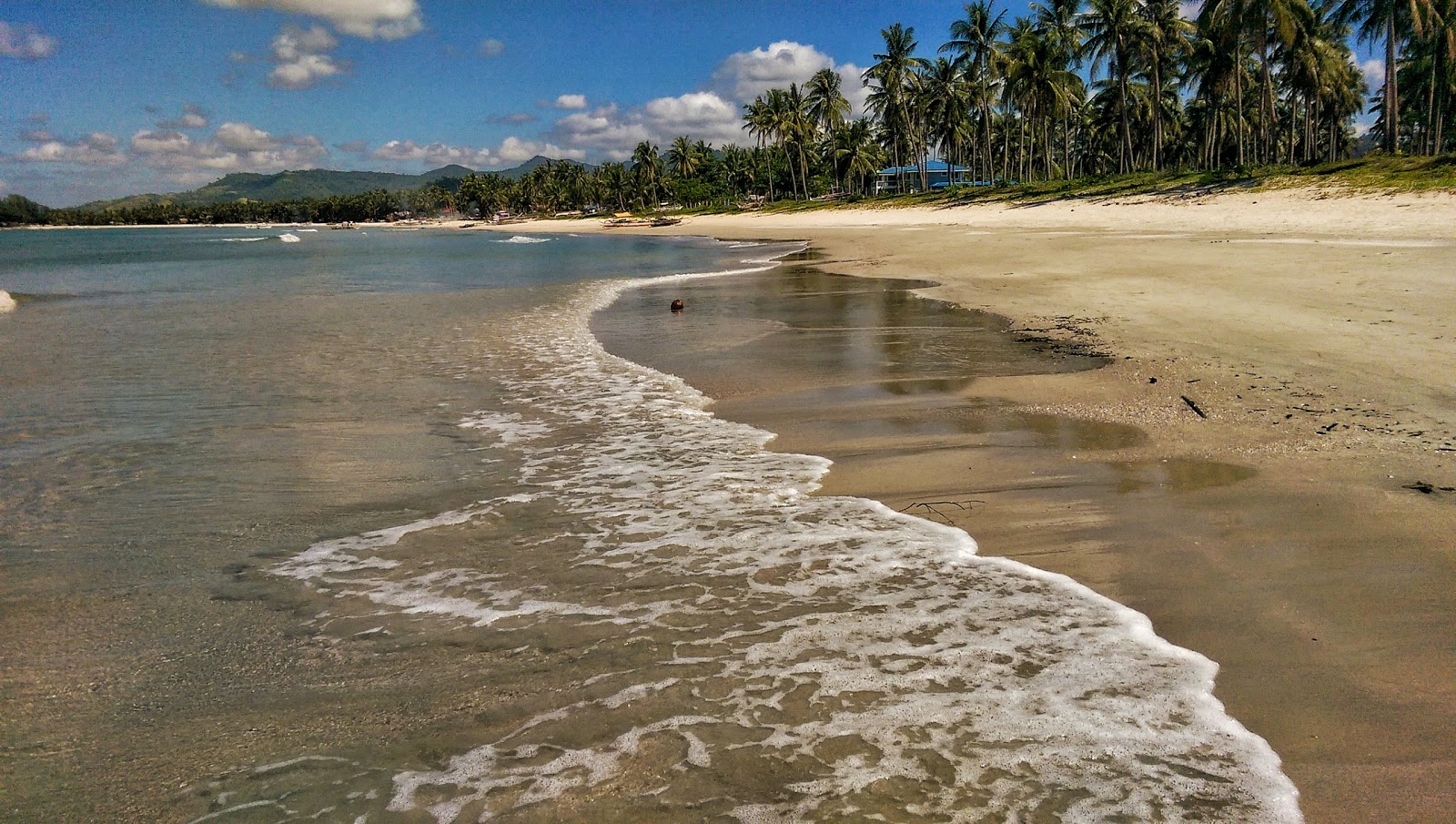 Photo of Long Beach with turquoise pure water surface