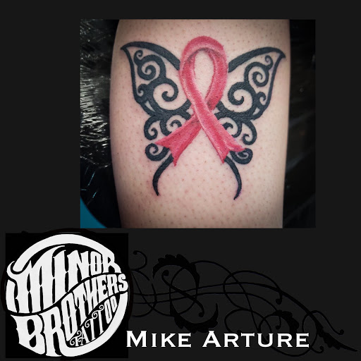 Explore first son tattoo ideas, creative tattoo ideas in Natrona Heights, available at Minor Bros. Tattoo & Time Machine Co.