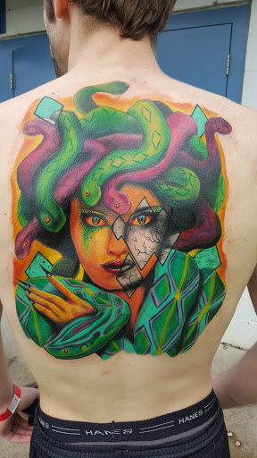 Explore women's back tattoo ideas, creative tattoo ideas in Dayton, available at Modified Skin Tattoos