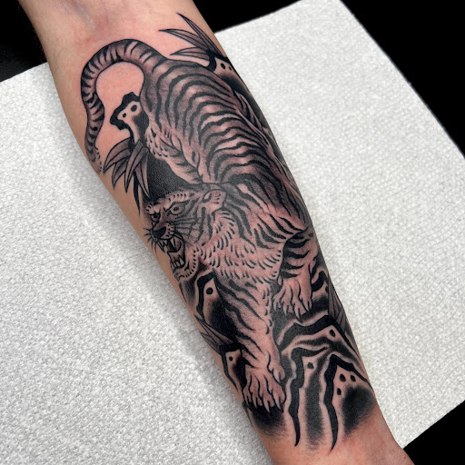 Explore wild idea tattoo, creative tattoo ideas in Nashua, available at Sundance Tattoo Parlor