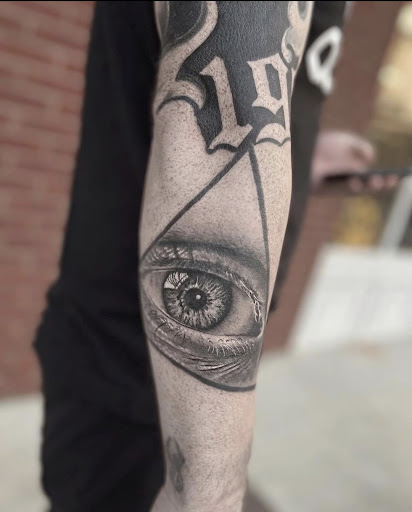 Explore skull forearm tattoo ideas, creative tattoo ideas in Valdosta, available at Acid Ink Tattoos