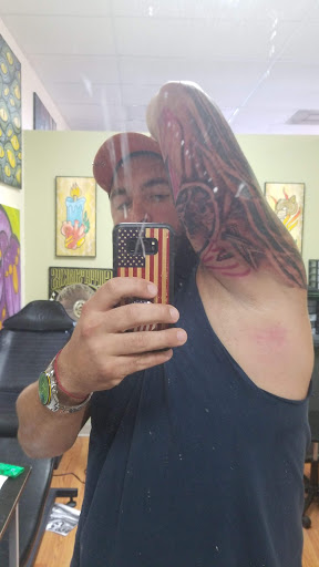 Tattoo Shop «Orlando Tattoo Company», reviews and photos, 11229 E Colonial Dr, Orlando, FL 32817, USA