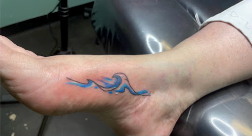 Explore feminine foot tattoo ideas, creative tattoo ideas in Meridian, available at Creative Pain Tattoo Studio